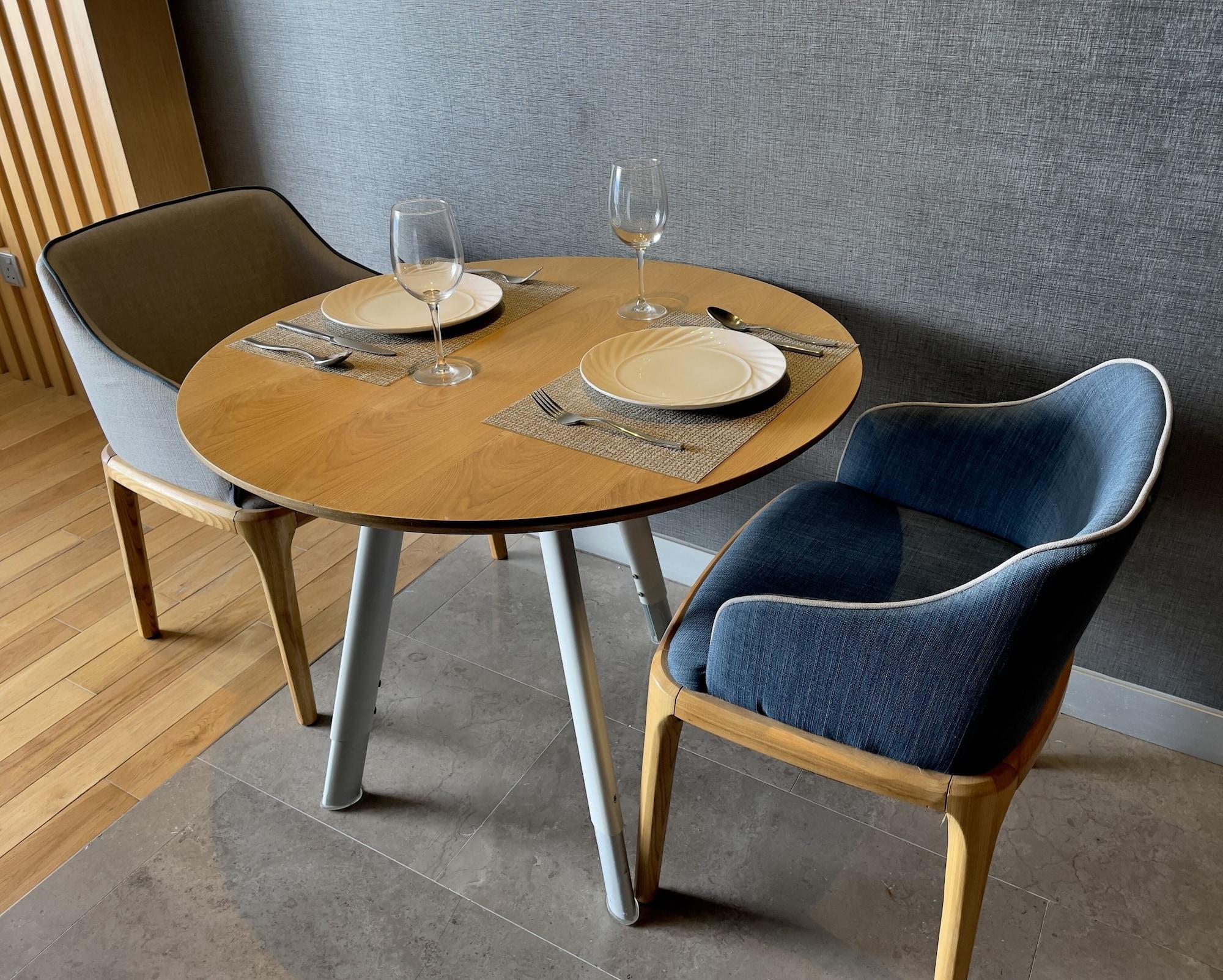 Fraser Place Puteri Harbour Nusajaya  Exterior photo A table and two chairs