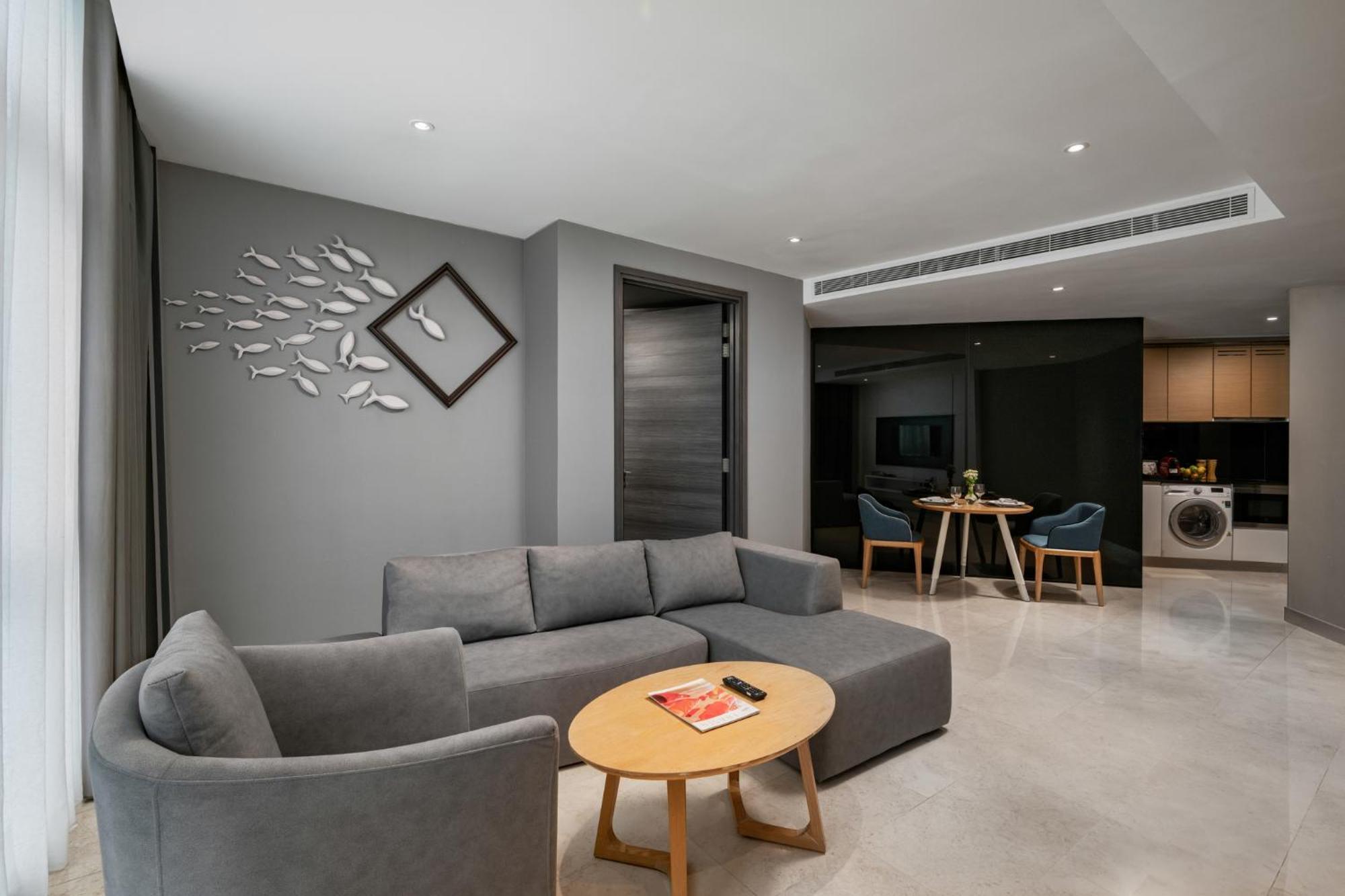 Fraser Place Puteri Harbour Nusajaya  Exterior photo A living room in a serviced apartment in Singapore